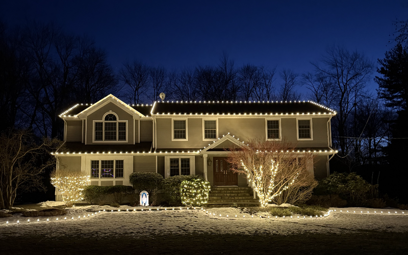 Short Hills NJ colonial with C9 roofline lights, wrapped front tree and lighted pathway