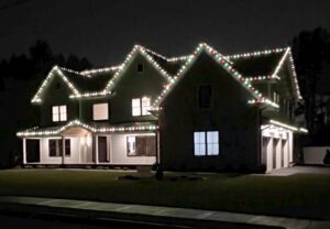 New construction Short Hills NJ home with red and green C9 lights on every roofline